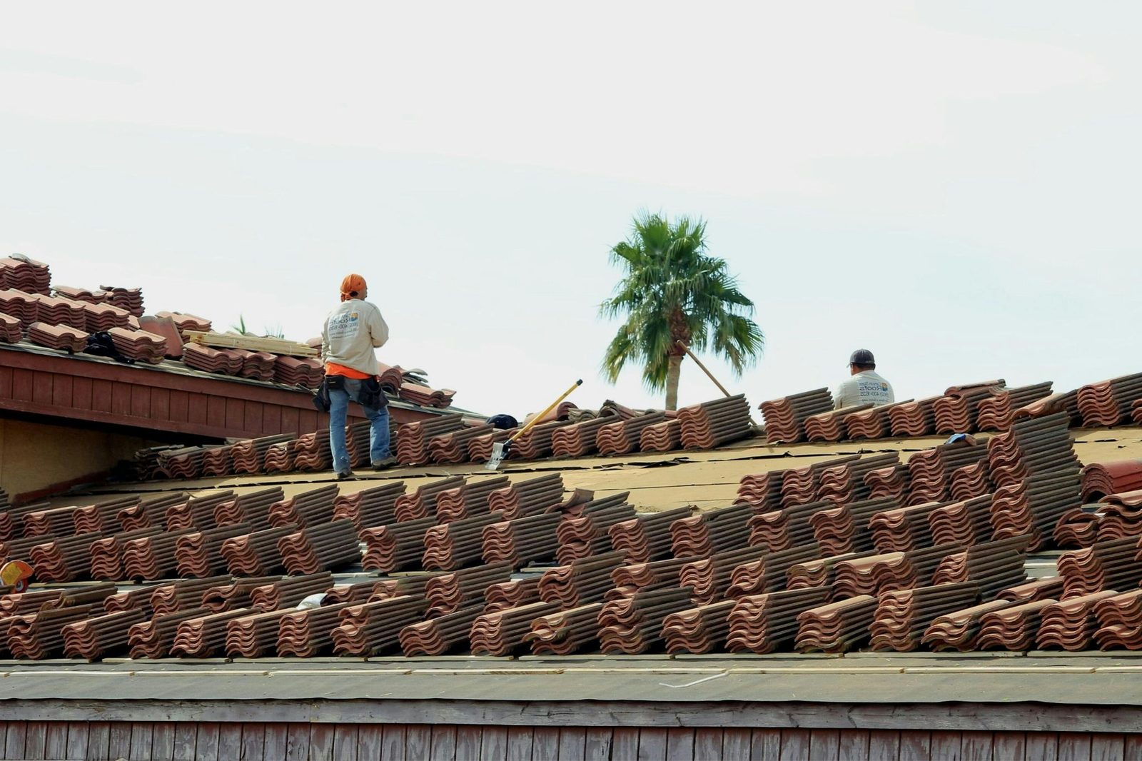 North Canyon Roofing crew laying new tile on a residential Arizona roof